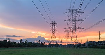 electric power lines at sunset