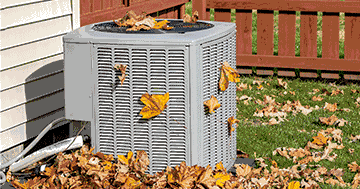 ac system surrounded by debris