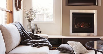 living room with glass fireplace