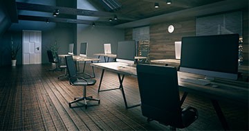 office space with computers turned off at night