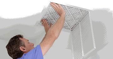 man changing air filter