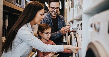 family looking at appliances