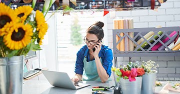 small business owner talking on phone