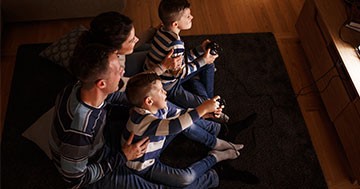 Family playing video game