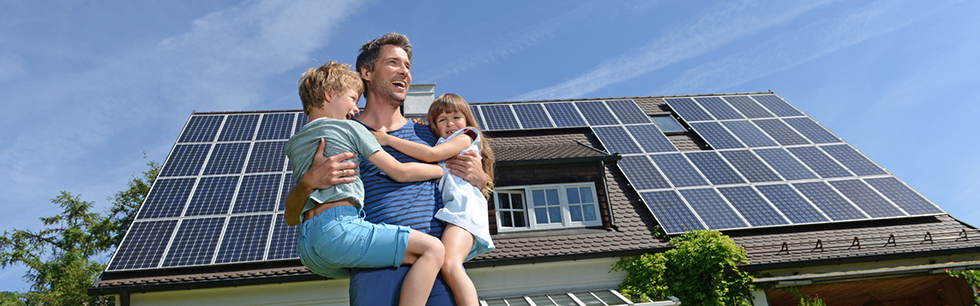 In garden of solar paneled house